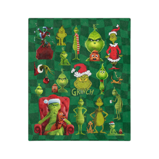 The Grinch Blanket with plaid background